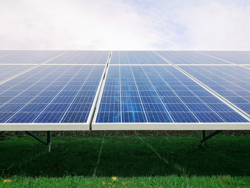 Close-up of solar panels under blue sky
